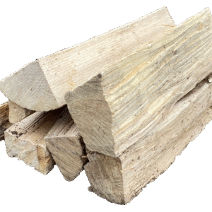 Stacked Birch firewood logs seasoned and split for fireplaces and fire pits