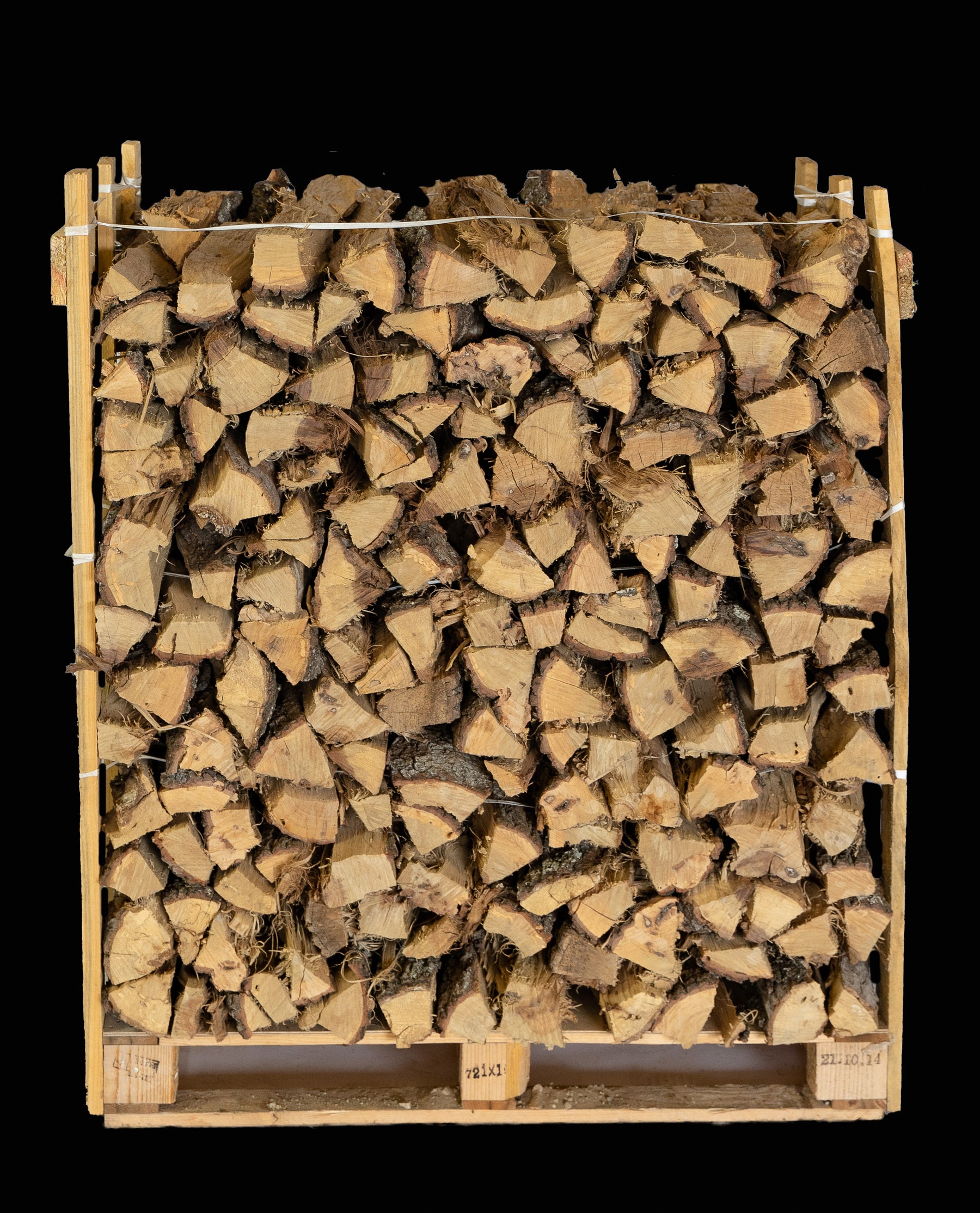 Stacked Shagbark Hickory firewood logs seasoned and split for fireplaces, wood stoves, and BBQ